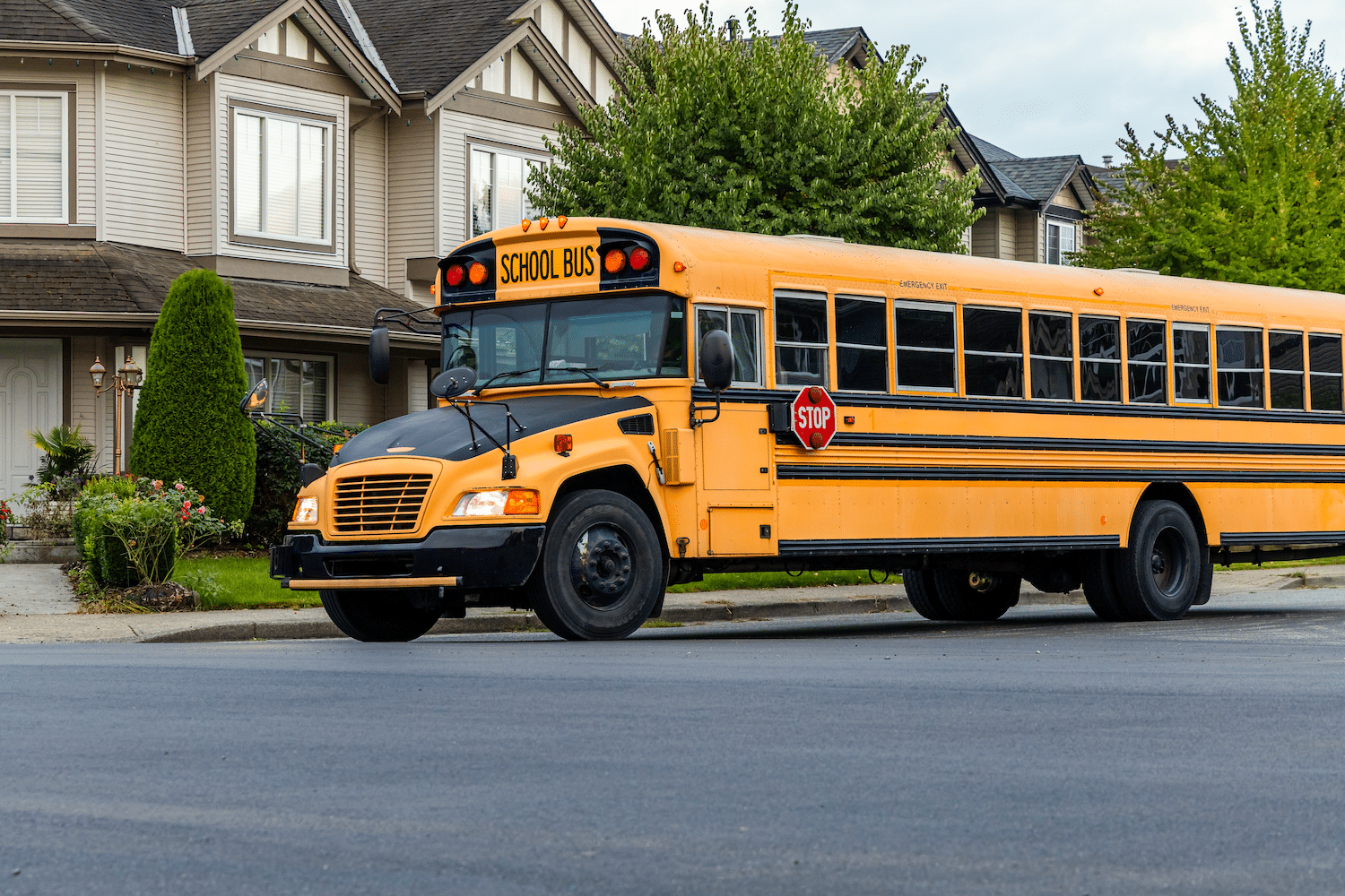 School Bus in Front of a Home